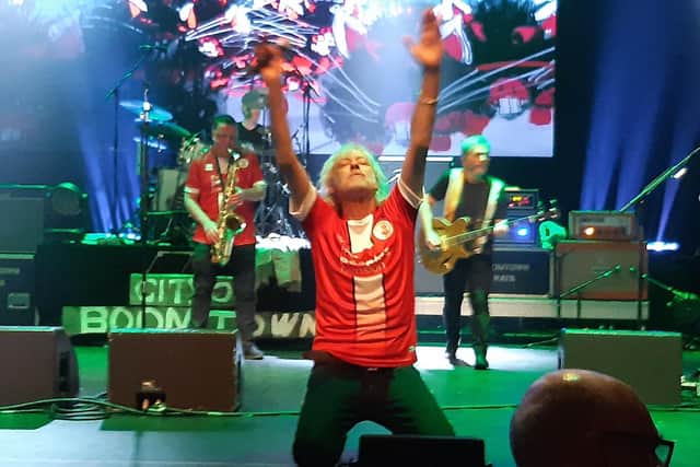Bob Geldof wearing a Crawley Town shirt at The Boomtown Rats' recent gig at the Hawth