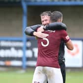 Chris Agutter celebrates with Craig Stone after Hastings' FA Cup win at Chippenham a month ago / Picture: Scott White