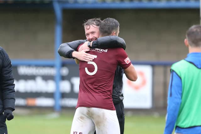 Chris Agutter celebrates with Craig Stone after Hastings' FA Cup win at Chippenham a month ago / Picture: Scott White