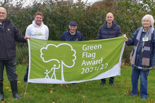 Friends of Old Town Recreation Park celebrating the 'green flag' award. Picture from Eastbourne Borough Council SUS-210211-145510001