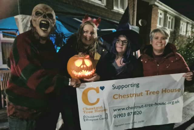 Mid Sussex MP Mims Davies and councillor Samantha Smith (Burgess Hill - Dunstall ward) attended a charity event at the home of Ricky and Naomi Butcher on Halloween that raised £150 for Chestnut Tree House.