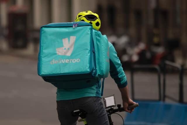 Deliveroo, the on-demand food delivery service, launched in Horley and East Grinstead just a few months ago - and locals already can't get enough of at-home delivery. Picture by Dan Kitwood/Getty Images