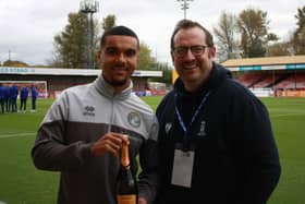 Mark Dunford presents Kwesi Appiah with his Player of the Month award - he scored all of Crawley's five goals in October