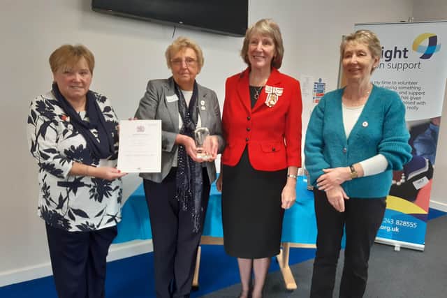 The Lord-Lieutenant of West Sussex, Mrs Susan Pyper, presents the Queen’s Award for Voluntary Service to volunteers Jean Hall, Margaret Russell and Gill Calderhead