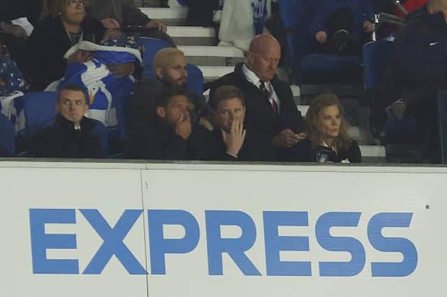 Eddie Howe is pictured at the Amex Stadium last Saturday with Newcastle co-owner Amanda Staveley