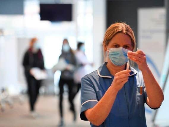 The Covid jab is to be compulsory for frontline NHS staff in England, the Government announced today (November 9) (Picture: Getty Images) SUS-210911-163620001