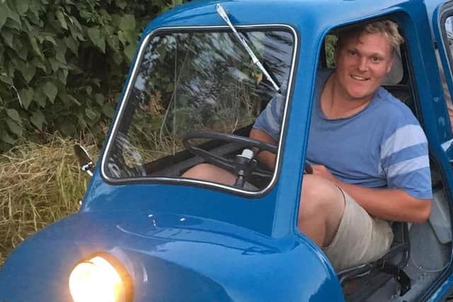 Alex Orchin from Wivelsfield is driving the world's smallest car, the Peel P50, from John o' Groats to Lands' End. Picture: Alex Orchin.