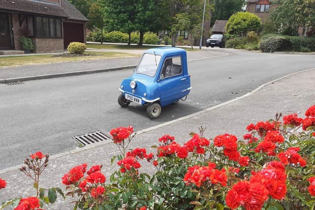 Alex Orchin from Wivelsfield is driving the world's smallest car, the Peel P50, from John o' Groats to Lands' End. Picture: Alex Orchin.