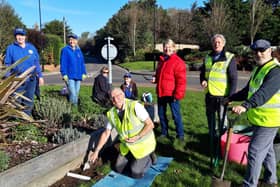 Littlehampton Satellite Rotary Club and the Angmering in Bloom team working on the roundabout in Roundstone Road, Angmering