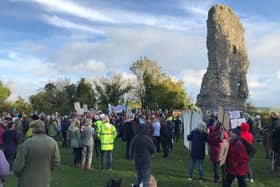Marchers gathered for a rally at the ruins of Bramber Castle