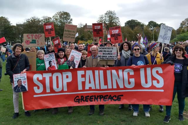 Stop Failing Us was the message from those who joined the march with Greenpeace volunteers