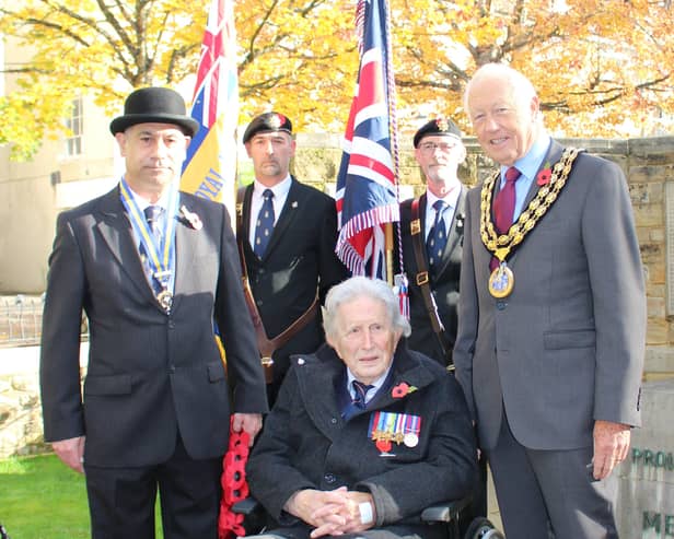 War veteran Geoffrey Weaving, centre, with Horsham Royal British Legion chairman Zal Rustom and Horsham District Council chairman David Skipp