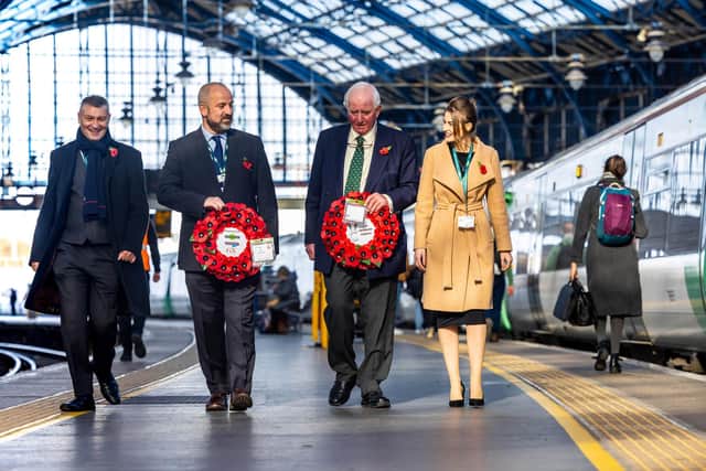 Ian Henderson (second right), Georgie Handford, Southern CIS Operator (first right), Nick Parker, Southern Head of Stations (second left), and Jim Cumming (first left) at Brighton station. Photo: Ciaran McCrickard/PA Wire