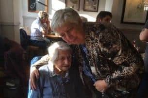 Nora Clifford celebrates her 102nd birthday surrounded by friends and family at a party in Hassocks.