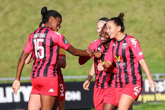 Lewes women's Freda Ayisi is congratulated for finding the net against Watford