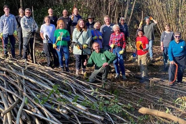 Rangers enjoying coppicing in Stanmer Park