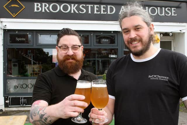 The Brooksteed manager John Azzopardi, left, with Tom Flint, his partner at Bottle & Jug Dept, who arranged for Lottie Bedlow to judge the Christmas Bake Off. Picture: Derek Martin DM1833648a