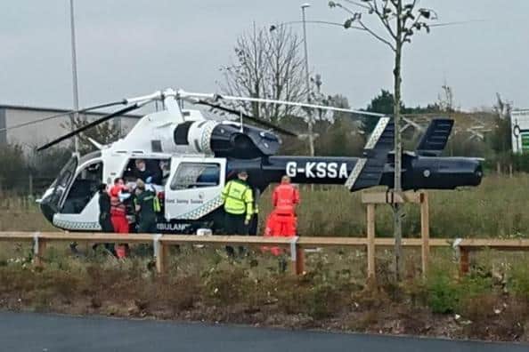 An air ambulance landed nearby after the crash on the A259, with the junction of the A29 Shripney Road. Photo: Stu Tranter