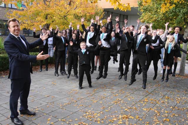 Kieran Scanlon, principal, and some of the students celebrate after The Sir Robert Woodard Academy is officially named a 'good' school by Ofsted. Photo by Derek Martin Photography and Art