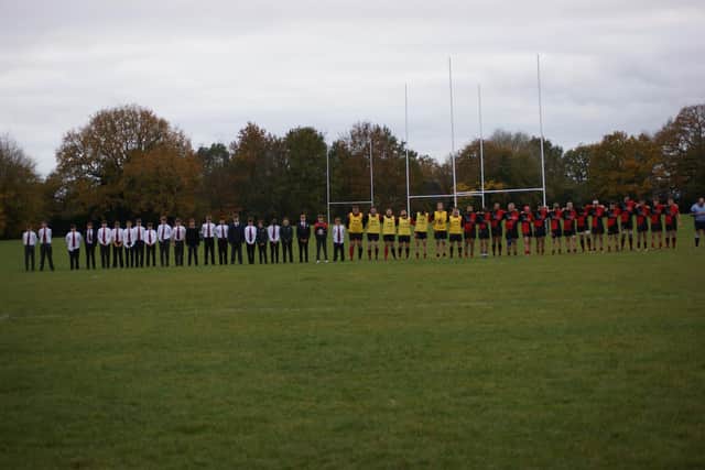 Heath under-13s joined the senior squad in a minute's silence before kick off