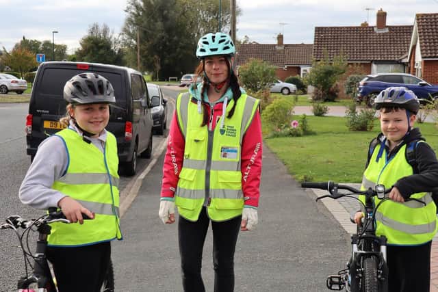 Bikeability instructor with two Southway Primary School pupils in Bognor Regis.