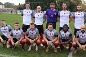 Horsham YMCA before their game with Lingfield, wearing commemorative poppies on their shirts. Pictures by Tim Hewlett