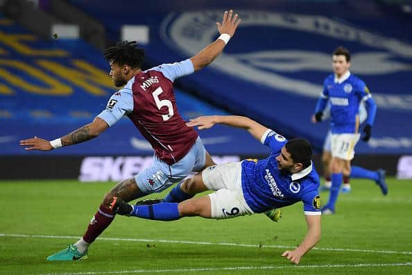 Brighton striker Neal Maupay and Aston Villa Tyrone Mings get themselves into  tangle