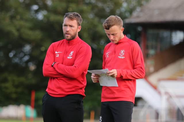 Chris Agutter with Ben Cornelius on the sidelines as Hastings boss / Picture: Scott White