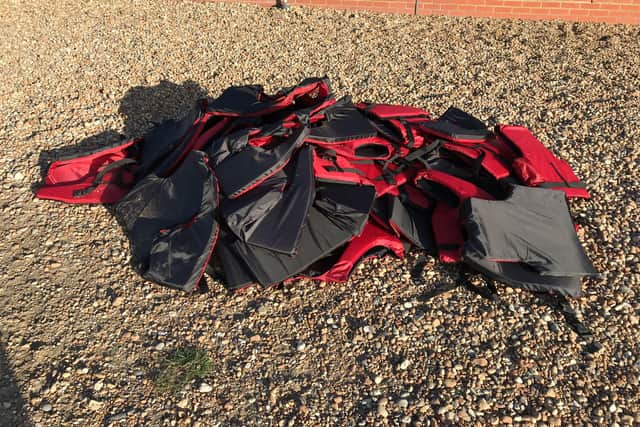 Lifejackets worn by the 40 migrants who arrived on Hastings beach on Tuesday