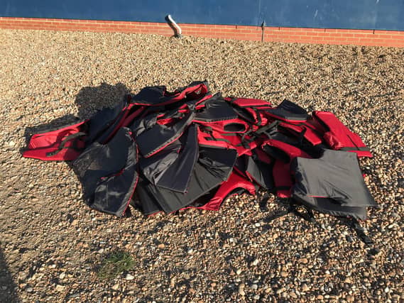 Lifejackets worn by the 40 people who arrived on Hastings beach earlier this month