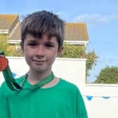 10-year-old Oliver Barnes walked 438 laps of his garden to participate in the Angel’s Walk