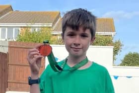 10-year-old Oliver Barnes walked 438 laps of his garden to participate in the Angel’s Walk