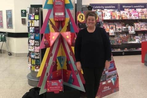 Louise Coffey, community champion at Morrisons in Kemptown by the store’s giving tree