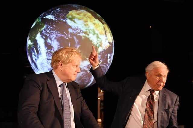 Sir David Attenborough and Prime minister Boris Johnson attend the launch of the UK-hosted COP26 UN Climate Summit. (Photo by Jeremy Selwyn - WPA Pool/Getty Images)