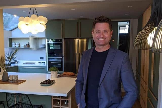 George Clarke from Old House, New Home, in Rachel and Sarah's new completed kitchen. Photo: Channel 4
