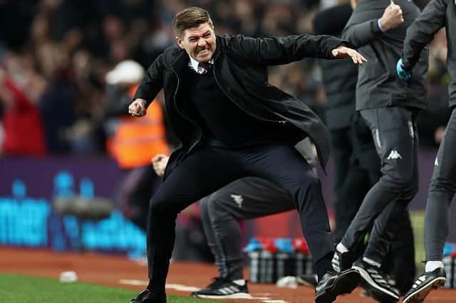 Steven Gerrard celebrates Aston Villa's late win against Brighton at Villa Park
