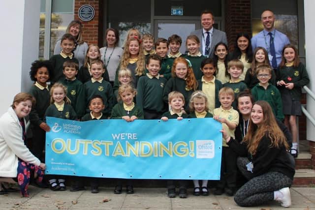 Staff and pupils celebrate the 'Outstanding' Ofsted rating for Lindfield Primary Academy.