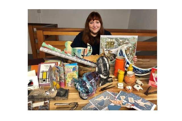 Holly Fox-Lee, Gallery Administrator, with a selection of what will be available at the new Oxmarket shop