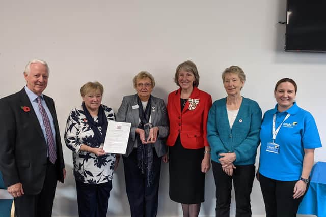 The volunteers receive the prestigious Queen’s Award for Voluntary Service.