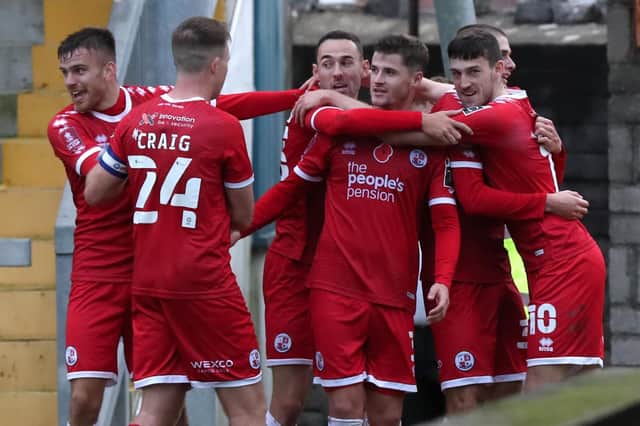 Crawley Town celebrates Ashley Nadesan's winning goal during the 6-5 win at Torquay United in the FA Cup. Picture by James Boardman/Telephoto Images