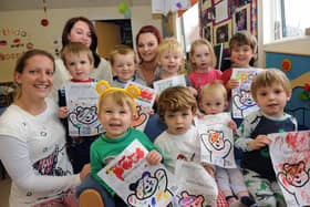Staff and children at Davison Day Nursery in 2011 with their Children in Need posters. Picture: Stephen Goodger W47590H11