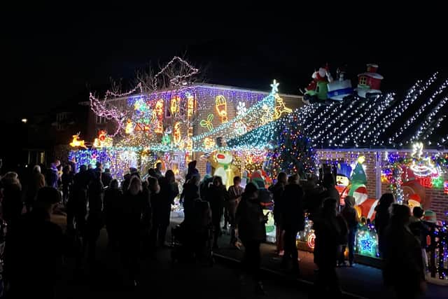 Residents in Saxifrage Way worked together to create the display, covering houses from top to bottom in shining Santas, terrific trees and a whole host of glittering creations