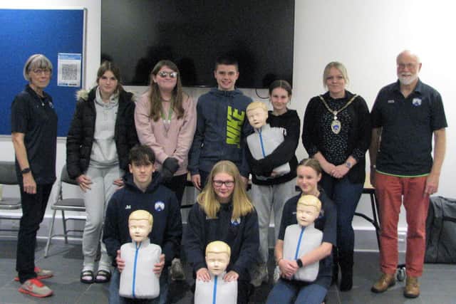 The club members with the mayor of Littlehampton, councillor Michelle Molloy, and the Junior Resuscitation Manikins Littlehampton Town Council presented
