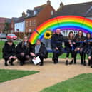 Renowned public artist Tim Ward with The Angmering School students at the unveiling of the new sculptural bench at Angmering Community Centre. Picture: Steve Robards SR2111243