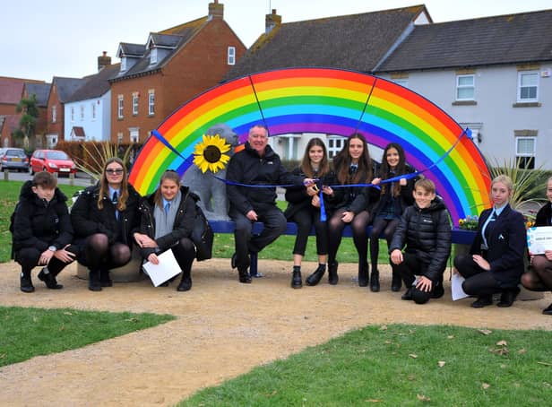 Renowned public artist Tim Ward with The Angmering School students at the unveiling of the new sculptural bench at Angmering Community Centre. Picture: Steve Robards SR2111243