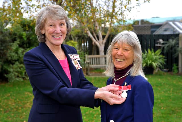 Celia Powis invested with the British Empire Medal by the Lord-Lieutenant of West Sussex, Mrs Susan Pyper. Picture: Steve Robards SR2111242