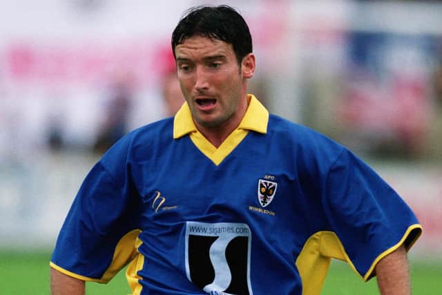 Former professional footballer Kevin Cooper is AFC Wimbledon's club record goalscorer, with 104 goals in 99 appearances, in all competitions between 2002 and 2004. Pictured is Cooper during the Combined Counties Premier Division match between Withdean 2000 and AFC Wimbledon on August 25, 2003 at the Woodside Road Ground in Worthing. (Photo by Dave Etheridge-Barnes/Getty Images)