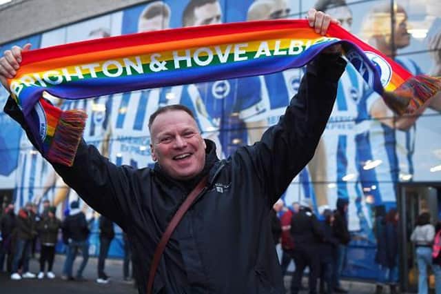 Brighton and Hove Albion fan supporting the Rainbow Laces campaign at the Amex Stadium