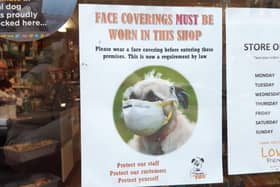 Love Pets in Beach Road has a sign on the door informing people to wear their masks before entering