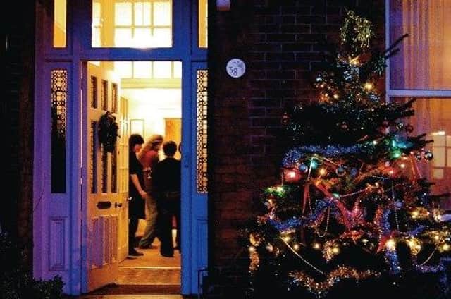 Christmas tree and open door: Picture by John Hesse SUS-210112-124756001